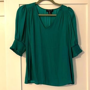 Satin green, perfect for a stunning holiday outfit, soft elastic sleeves.